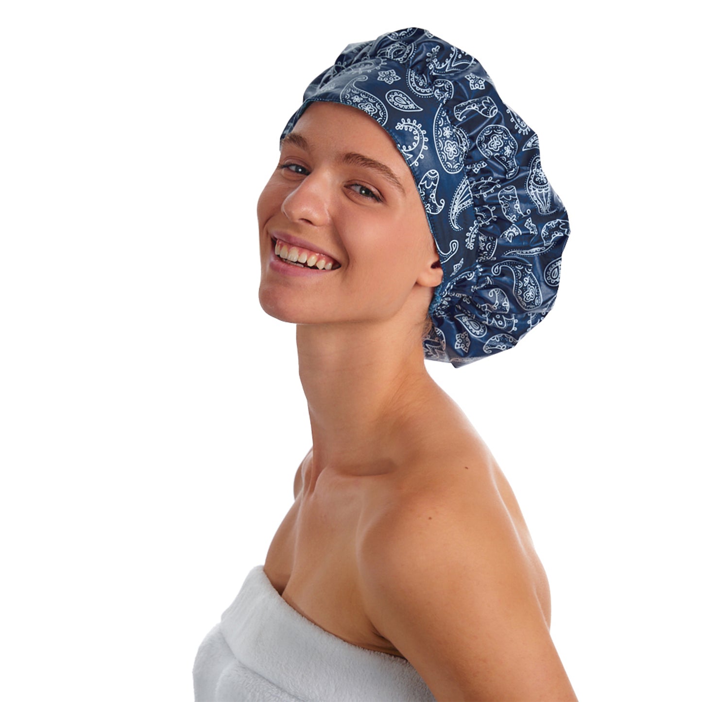 A BEAUTIFUL WOMAN WEARING THE TIARA SHOWER CAP PAISLEY DESIGN.